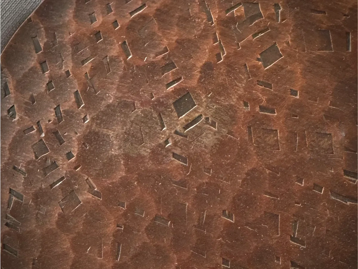Copper hand-hammered decorative metal sample texture