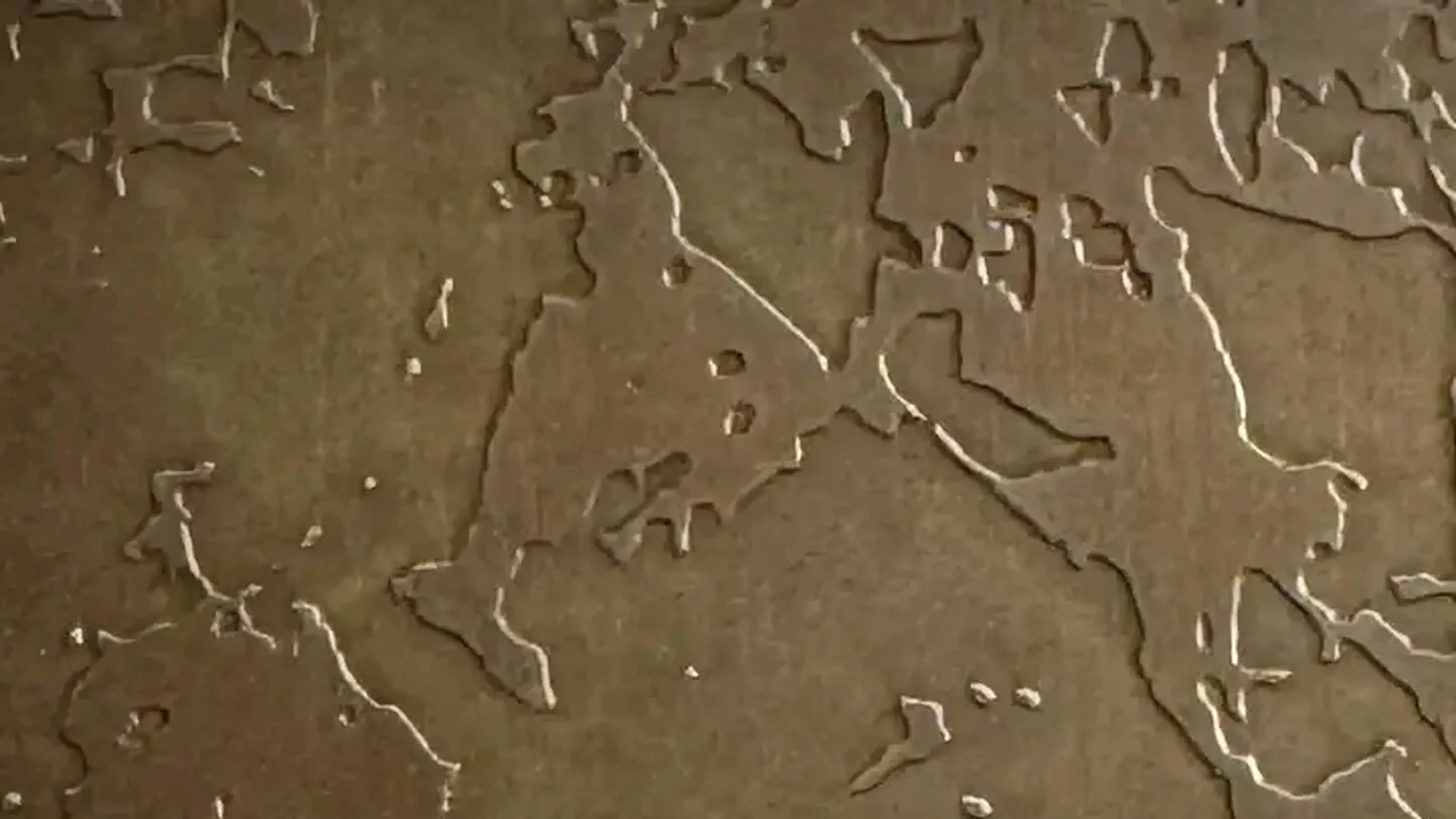 Dark etched bronze decorative metal material surface